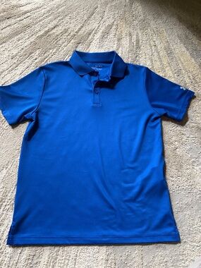 Boy’s Blue Under Armour polo youth large excellent condition